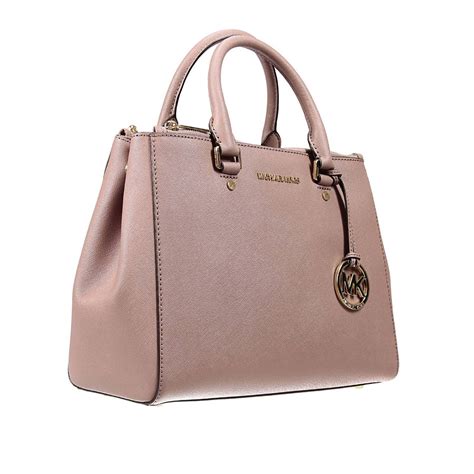 michael kors handbags in pink.